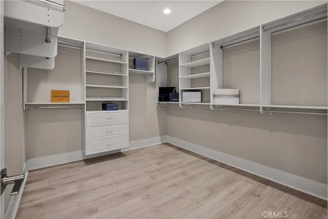 a view of an empty walk in closet