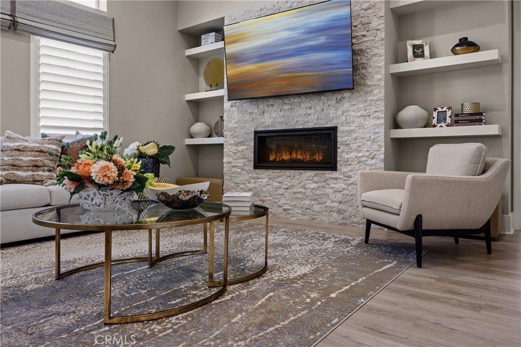 6505 Canyon Oaks Drive Simi Valley, CA 93063 - Photo 4 of 21 a living room with furniture and a fireplace