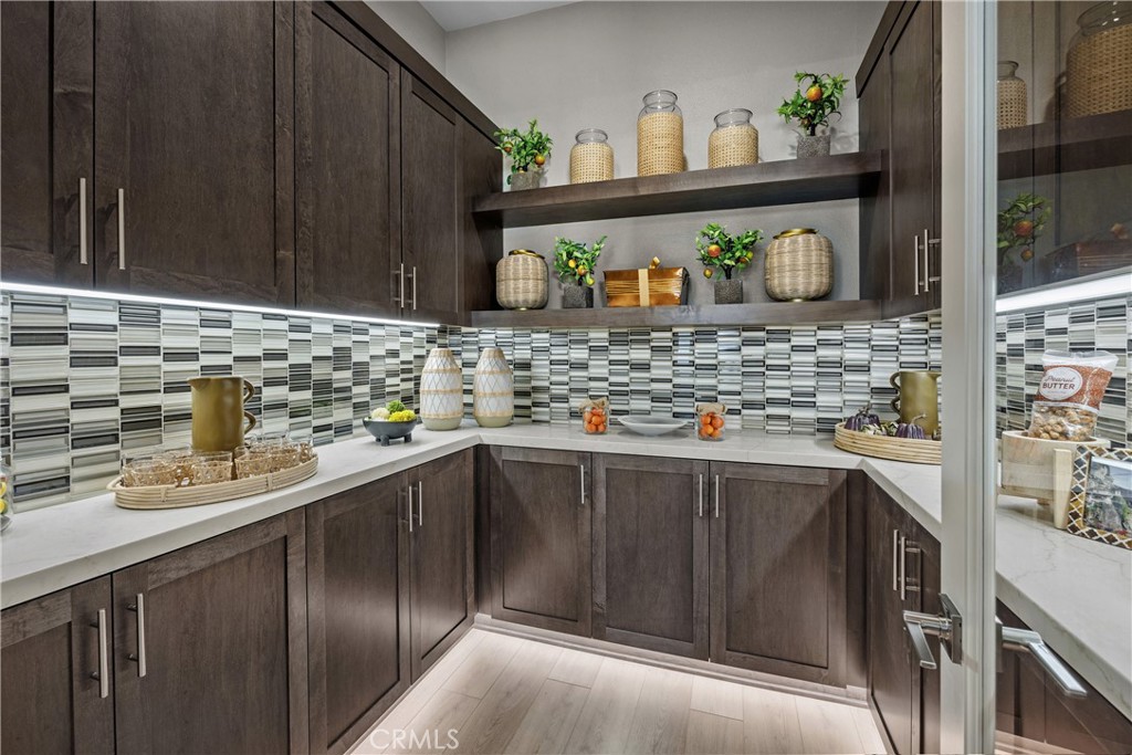 6505 Canyon Oaks Drive Simi Valley, CA 93063 - Photo 9 of 21 a kitchen with stainless steel appliances granite countertop a sink and a stove