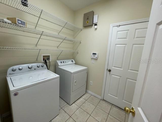 740 Pickfair Terrace Lake Mary, FL 32746 - Photo 11 of 26 a utility room with dryer and washer