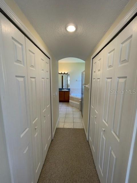 740 Pickfair Terrace Lake Mary, FL 32746 - Photo 15 of 26 a view of a hallway with white doors