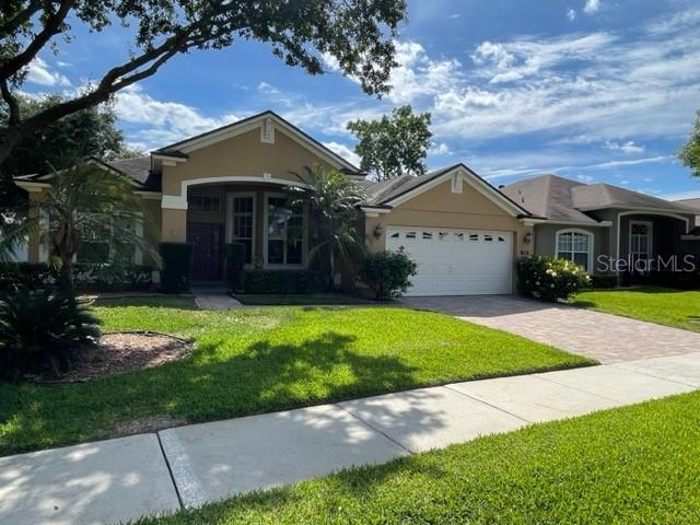 740 Pickfair Terrace Lake Mary, FL 32746 - Photo 2 of 26 a front view of a house with a yard