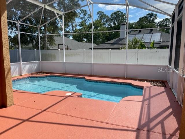 740 Pickfair Terrace Lake Mary, FL 32746 - Photo 24 of 26 a view of backyard with trampoline