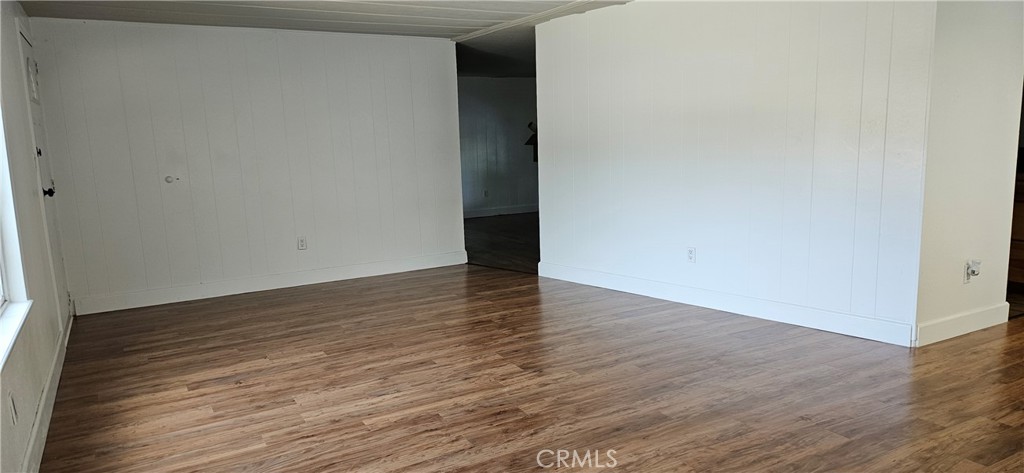 2920 Clark Road, Unit C12 Oroville, CA 95965 - Photo 6 of 17 a view of an empty room with wooden floor