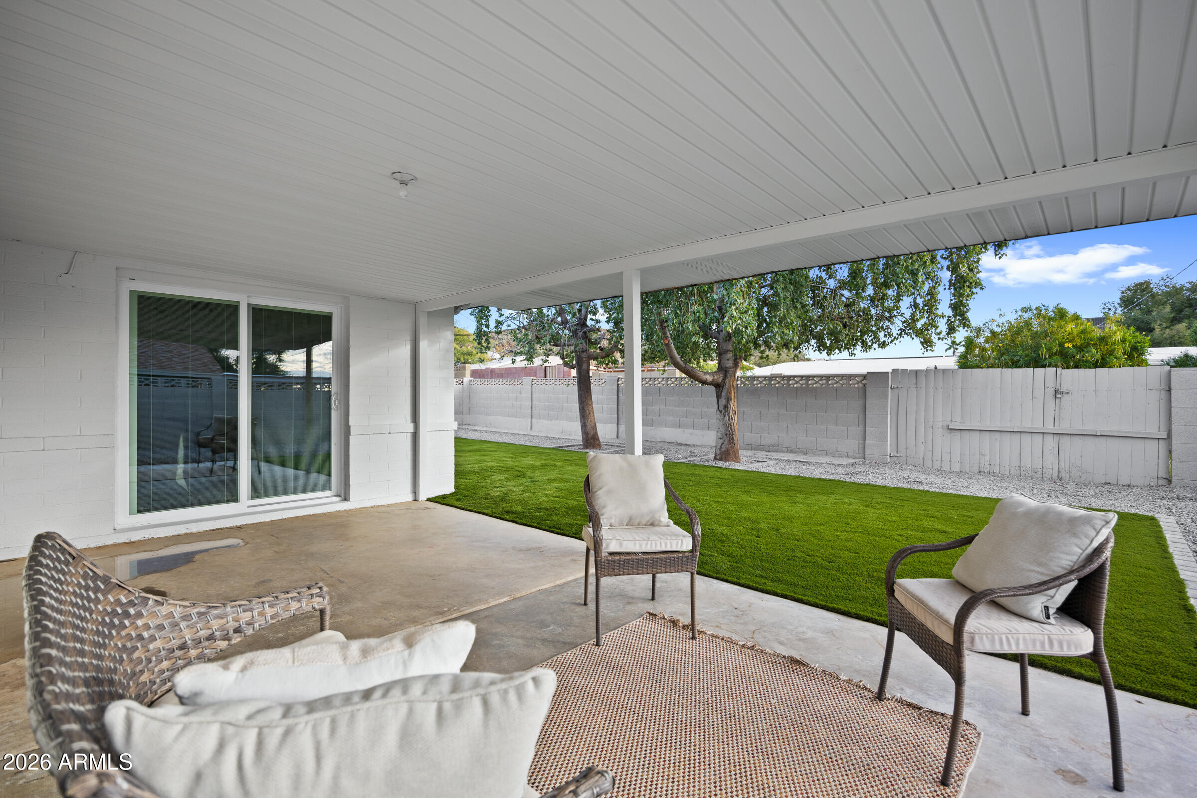 1237 East Ruth Avenue Phoenix, AZ 85020 - Photo 35 of 38 a balcony with furniture and a garden