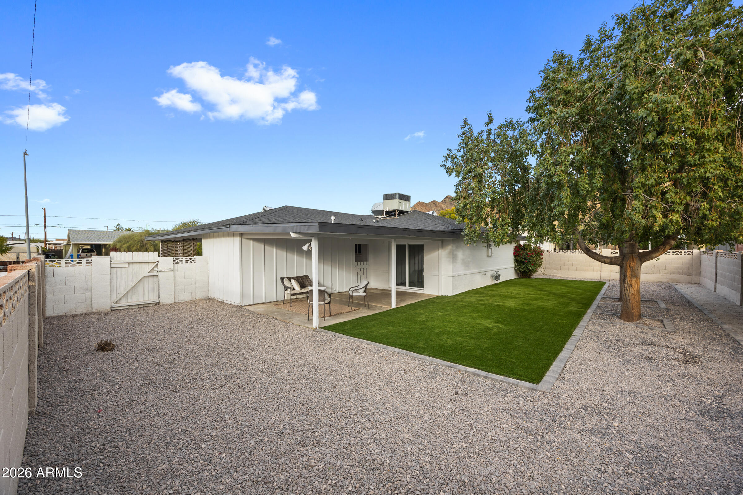1237 East Ruth Avenue Phoenix, AZ 85020 - Photo 36 of 38 a view of a house with a yard and tree s