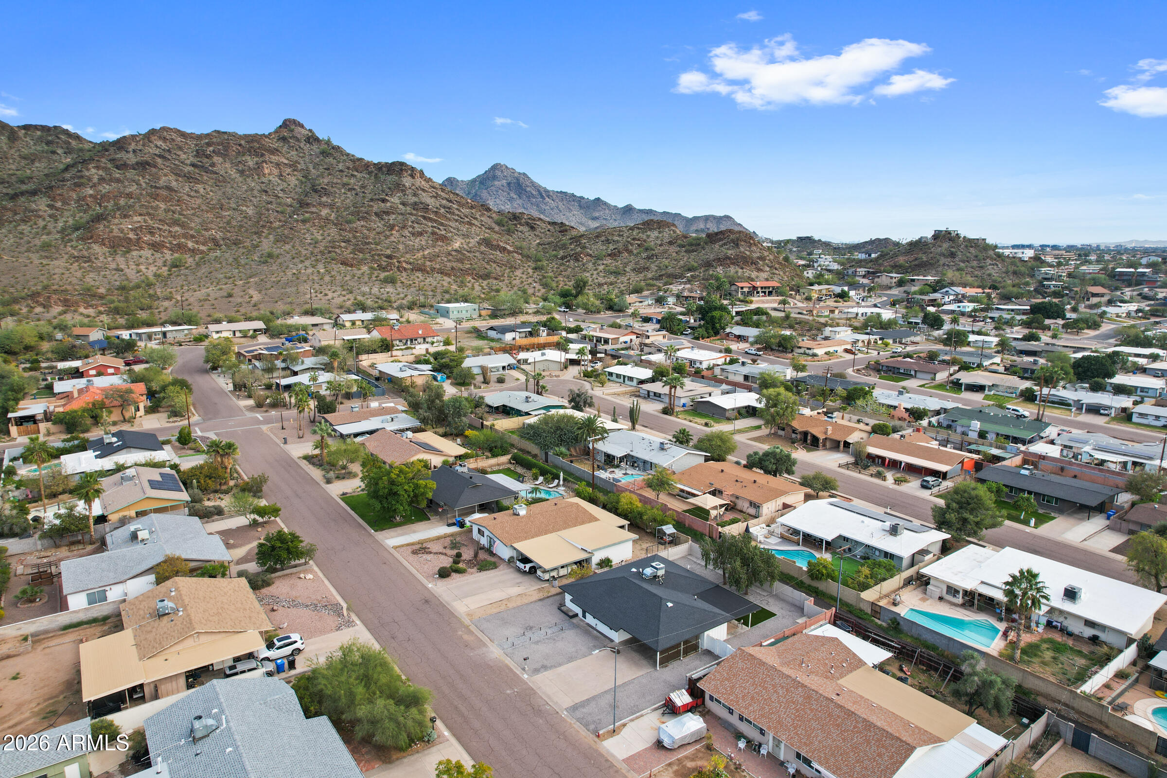 1237 East Ruth Avenue Phoenix, AZ 85020 - Photo 37 of 38 an aerial view of residential houses with outdoor space