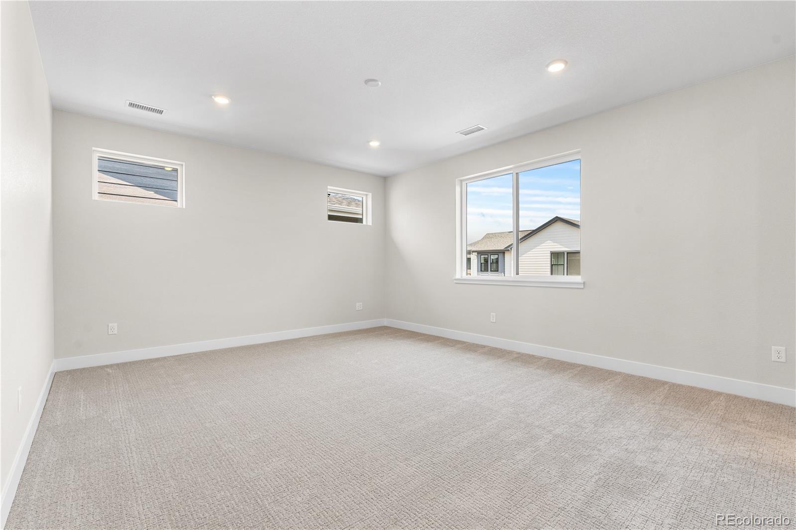 11208 Vibrato Lane Lone Tree, CO 80134 - Photo 28 of 40 an empty room with a window