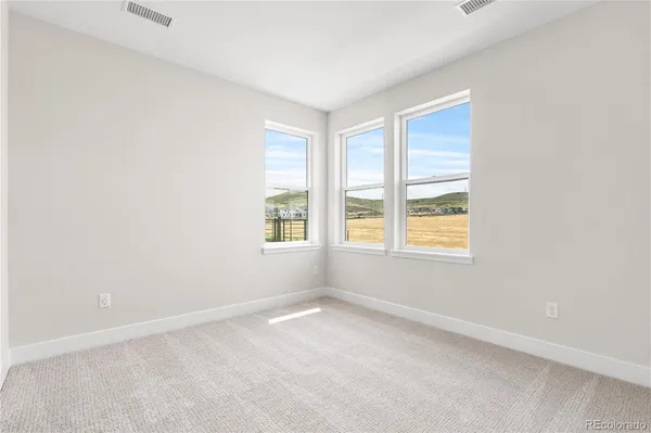 an empty room with windows