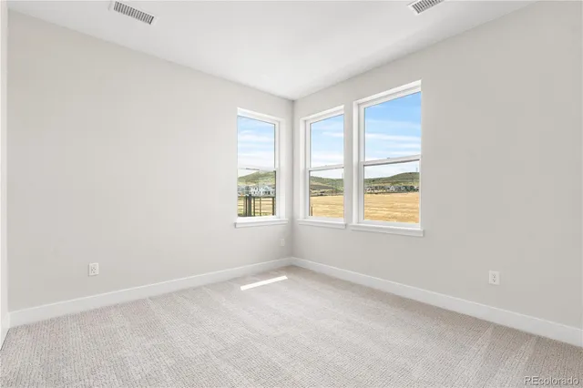 an empty room with windows