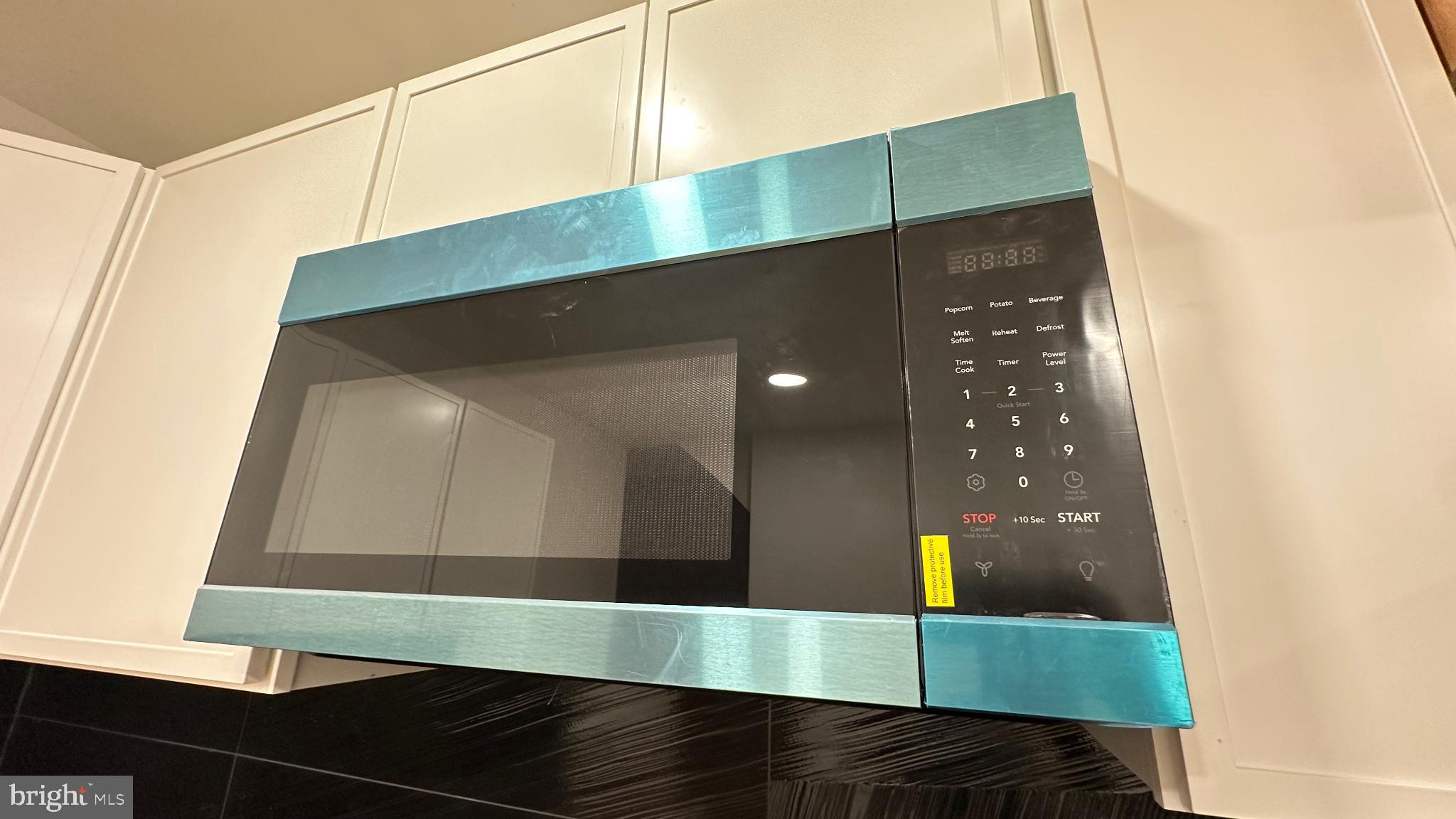 3924 North 13th Street, Unit A Philadelphia, PA 19140 - Photo 18 of 18 a bathroom with a large mirror