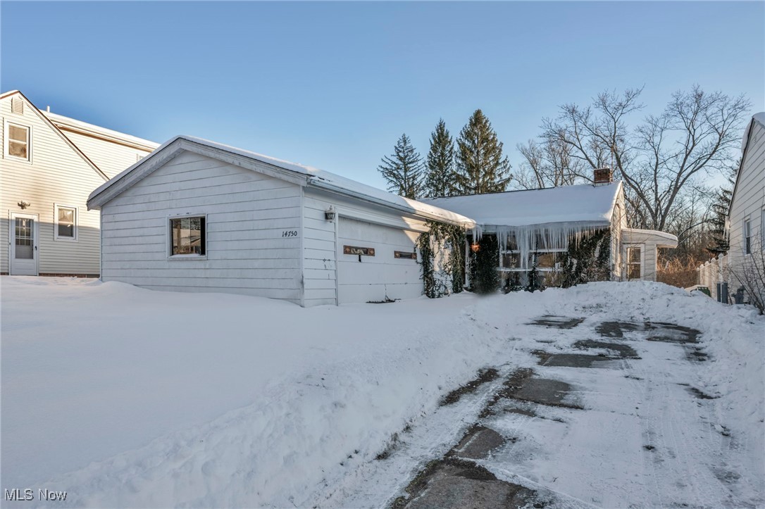14750 Schreiber Road Maple Heights, OH 44137 - Photo 2 of 44 Ranch-style house with a chimney and an attached garage