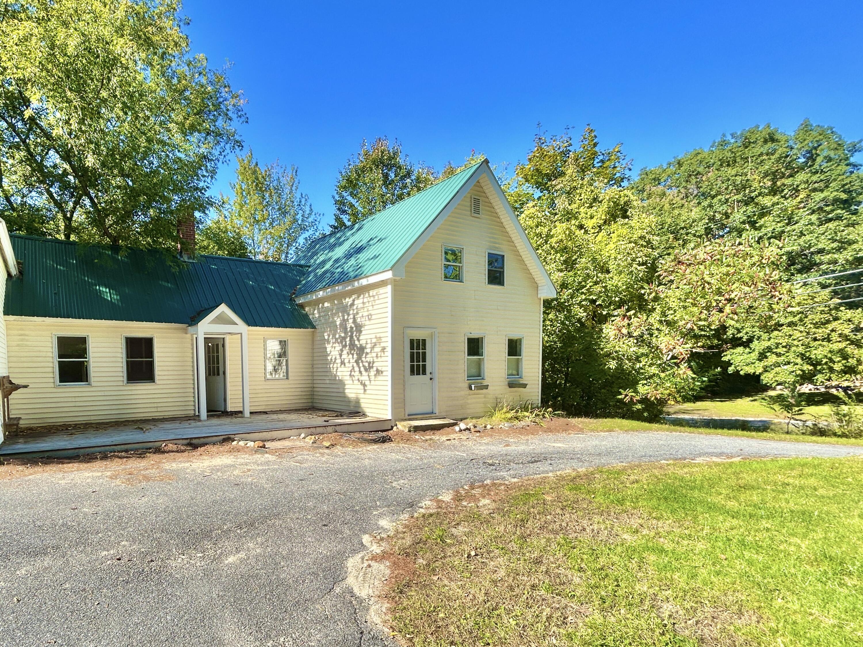 90 Oak Hill Road Standish, ME 04084 - Photo 1 of 18 Side view and driveway