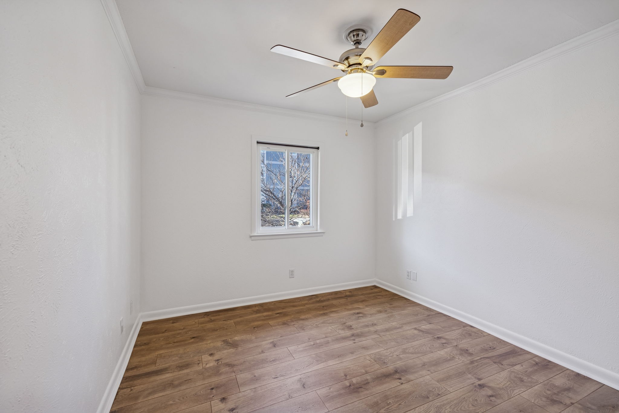 21 Vaughns Gap Road, Unit 14 Nashville, TN 37205 - Photo 15 of 26 an empty room with a window and ceiling fan