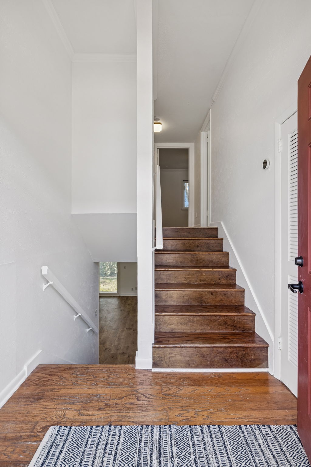 21 Vaughns Gap Road, Unit 14 Nashville, TN 37205 - Photo 2 of 26 a view of entryway and hall with wooden floor