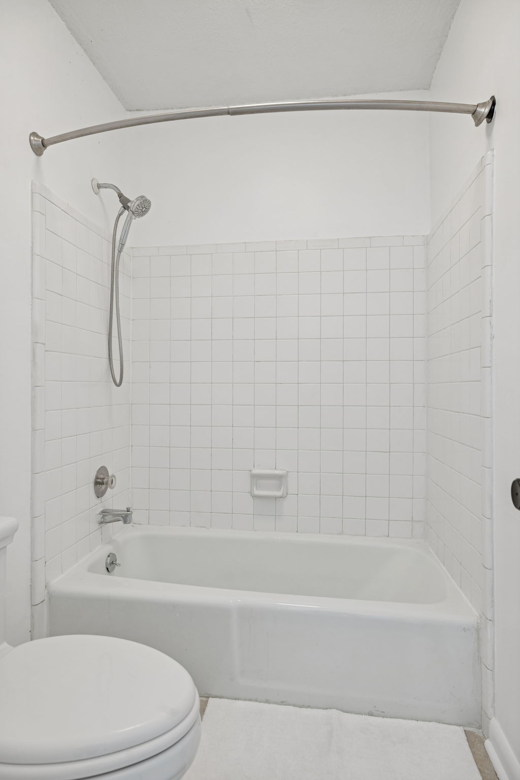 21 Vaughns Gap Road, Unit 14 Nashville, TN 37205 - Photo 24 of 26 a bathroom with a toilet bathtub and shower