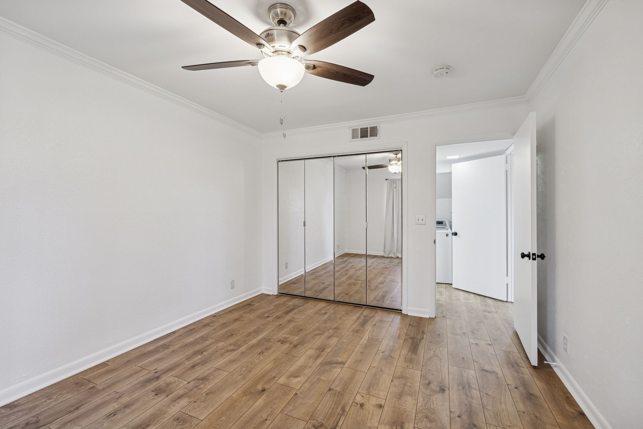 21 Vaughns Gap Road, Unit 14 Nashville, TN 37205 - Photo 10 of 26 a view of empty room with wooden floor