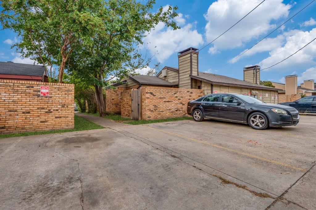 a car parked in front of a house