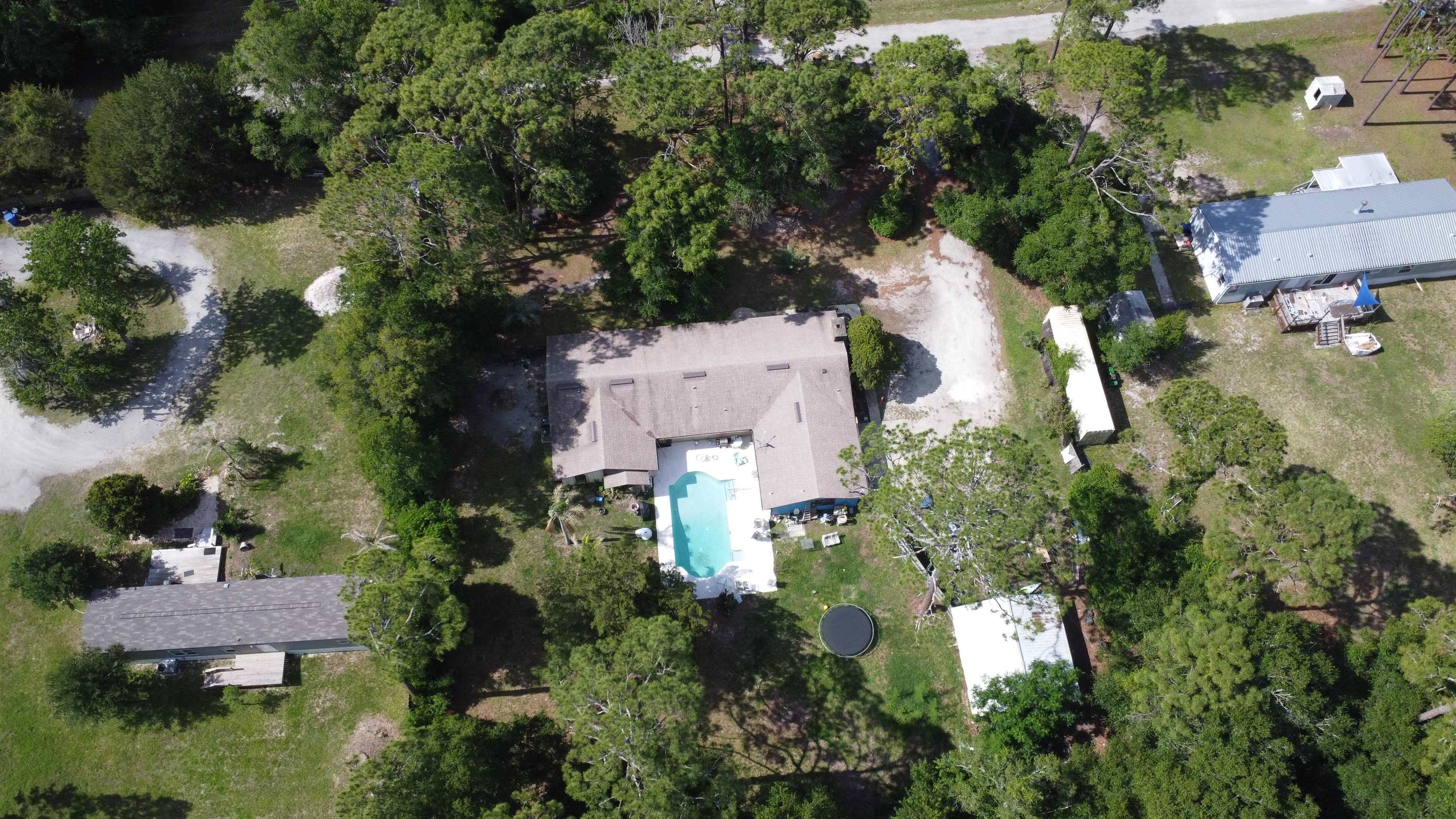 554 Hayley Road St. Augustine, FL 32086 - Photo 44 of 46 an aerial view of residential houses with outdoor space and trees all around