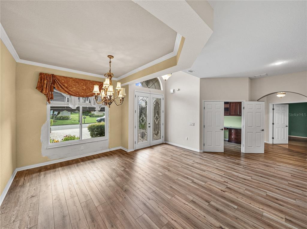 4004 Sable Loop Drive Lake Wales, FL 33859 - Photo 5 of 94 a view of a livingroom with wooden floor a ceiling fan and window