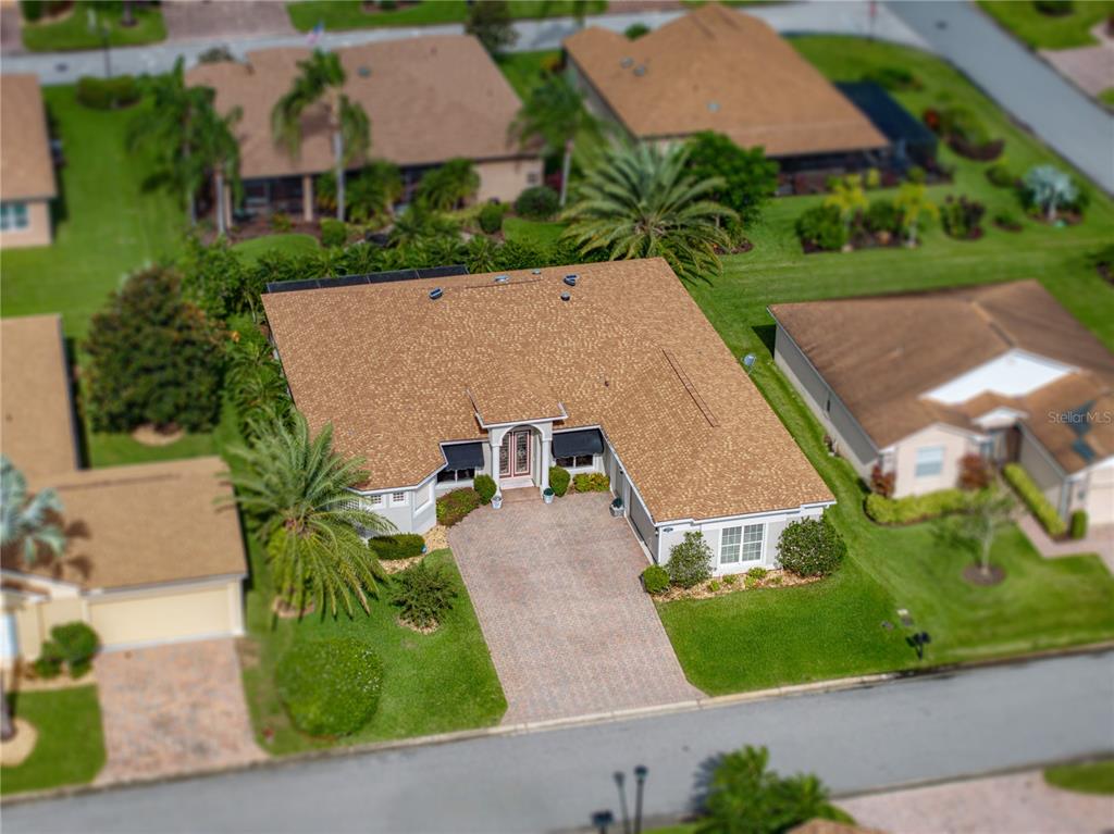 4004 Sable Loop Drive Lake Wales, FL 33859 - Photo 63 of 94 an aerial view of a house with yard swimming pool and outdoor seating