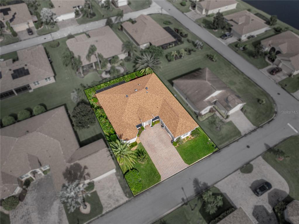 4004 Sable Loop Drive Lake Wales, FL 33859 - Photo 65 of 94 an aerial view of a house with a yard