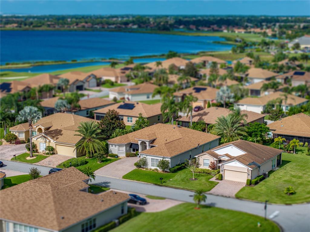 4004 Sable Loop Drive Lake Wales, FL 33859 - Photo 66 of 94 an aerial view of residential houses with outdoor space and river