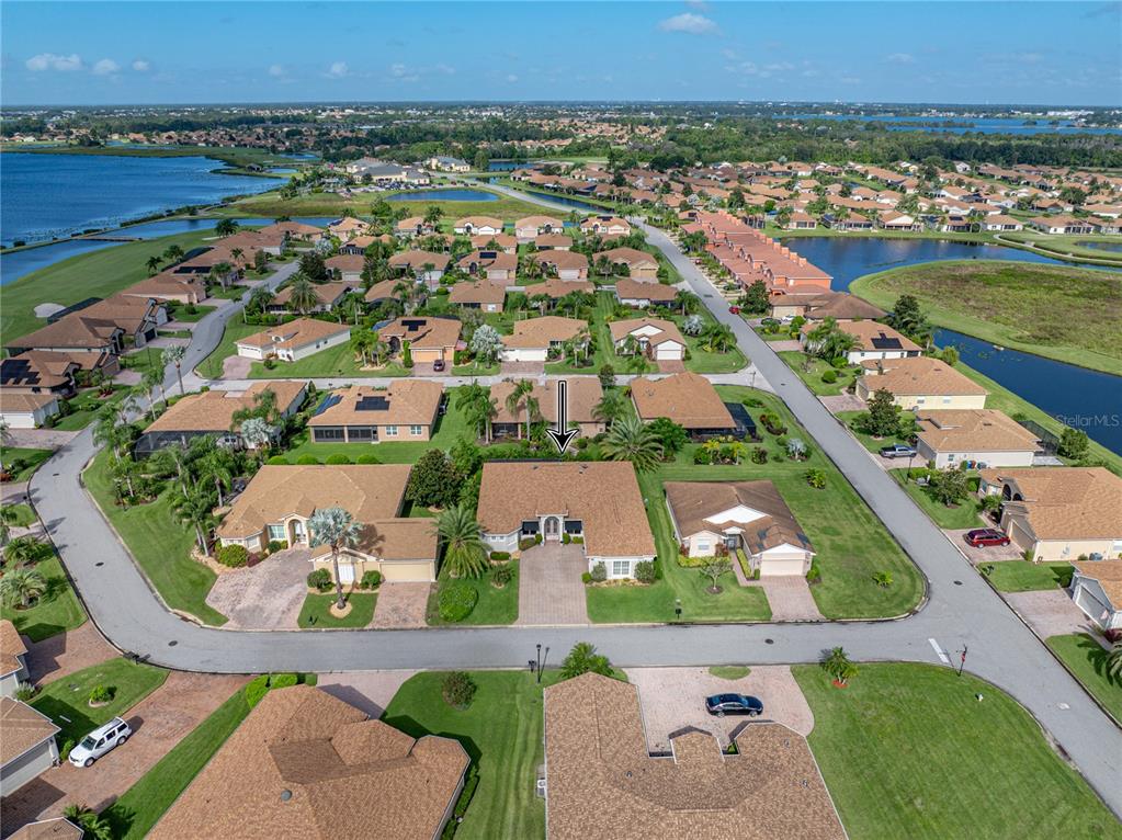 4004 Sable Loop Drive Lake Wales, FL 33859 - Photo 67 of 94 an aerial view of residential houses with outdoor space and river