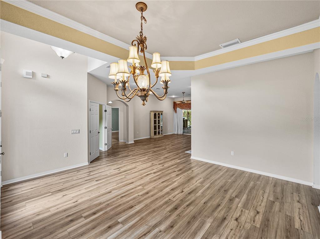 4004 Sable Loop Drive Lake Wales, FL 33859 - Photo 9 of 94 a view of a livingroom with wooden floor