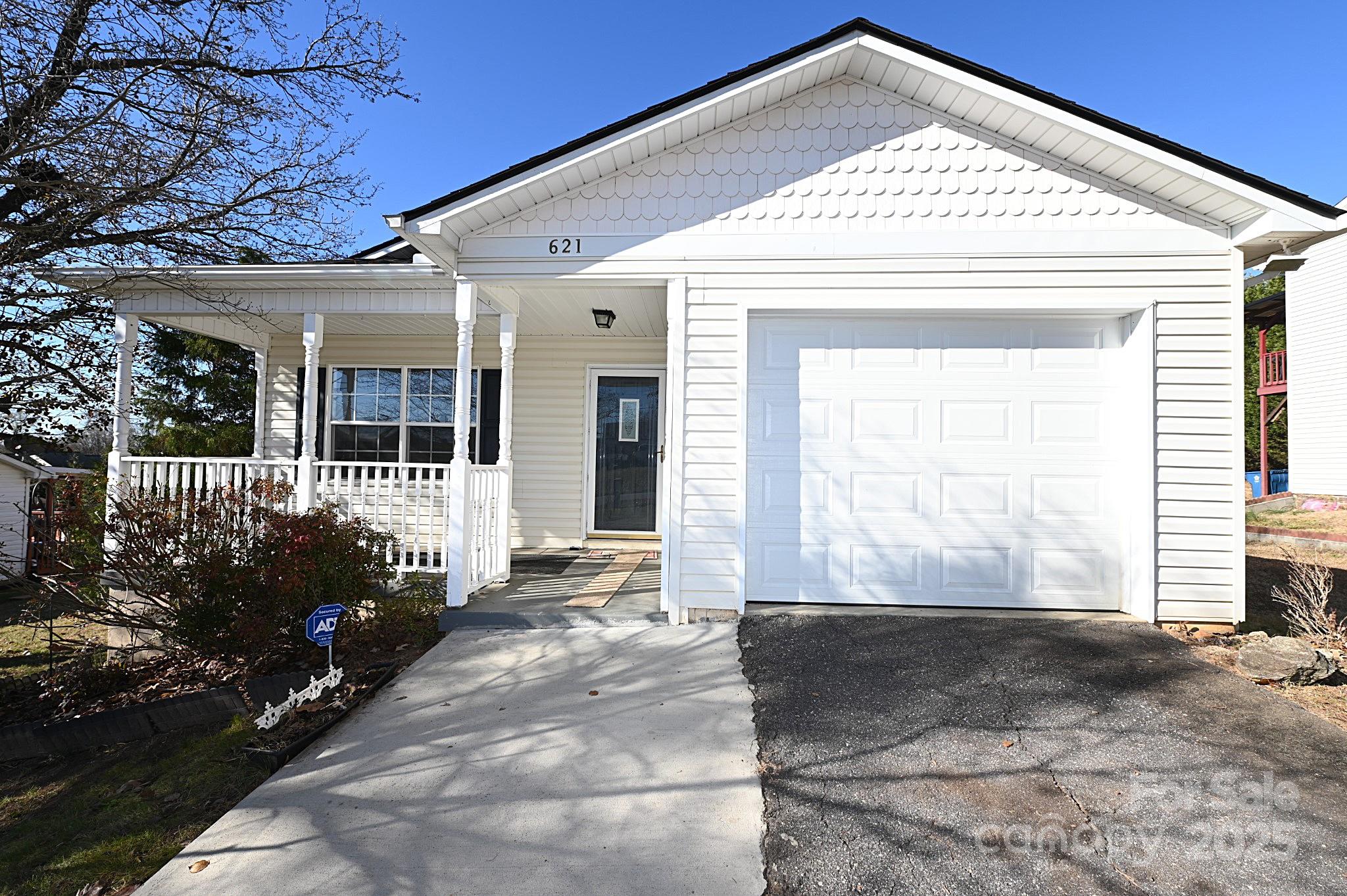 a view of entrance gate of a house