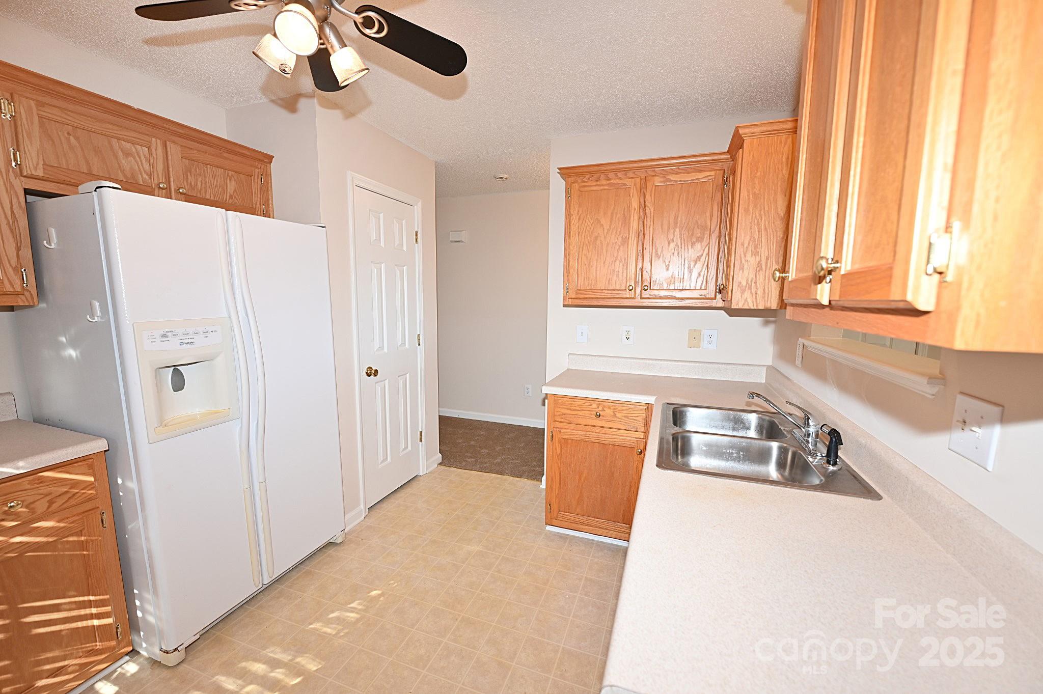 621 23rd Street Northwest Hickory, NC 28601 - Photo 14 of 35 a kitchen with stainless steel appliances a refrigerator and a sink