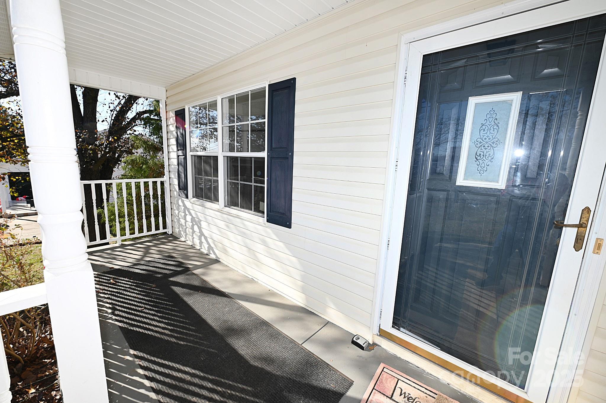 621 23rd Street Northwest Hickory, NC 28601 - Photo 3 of 35 a view of a balcony with wooden floor