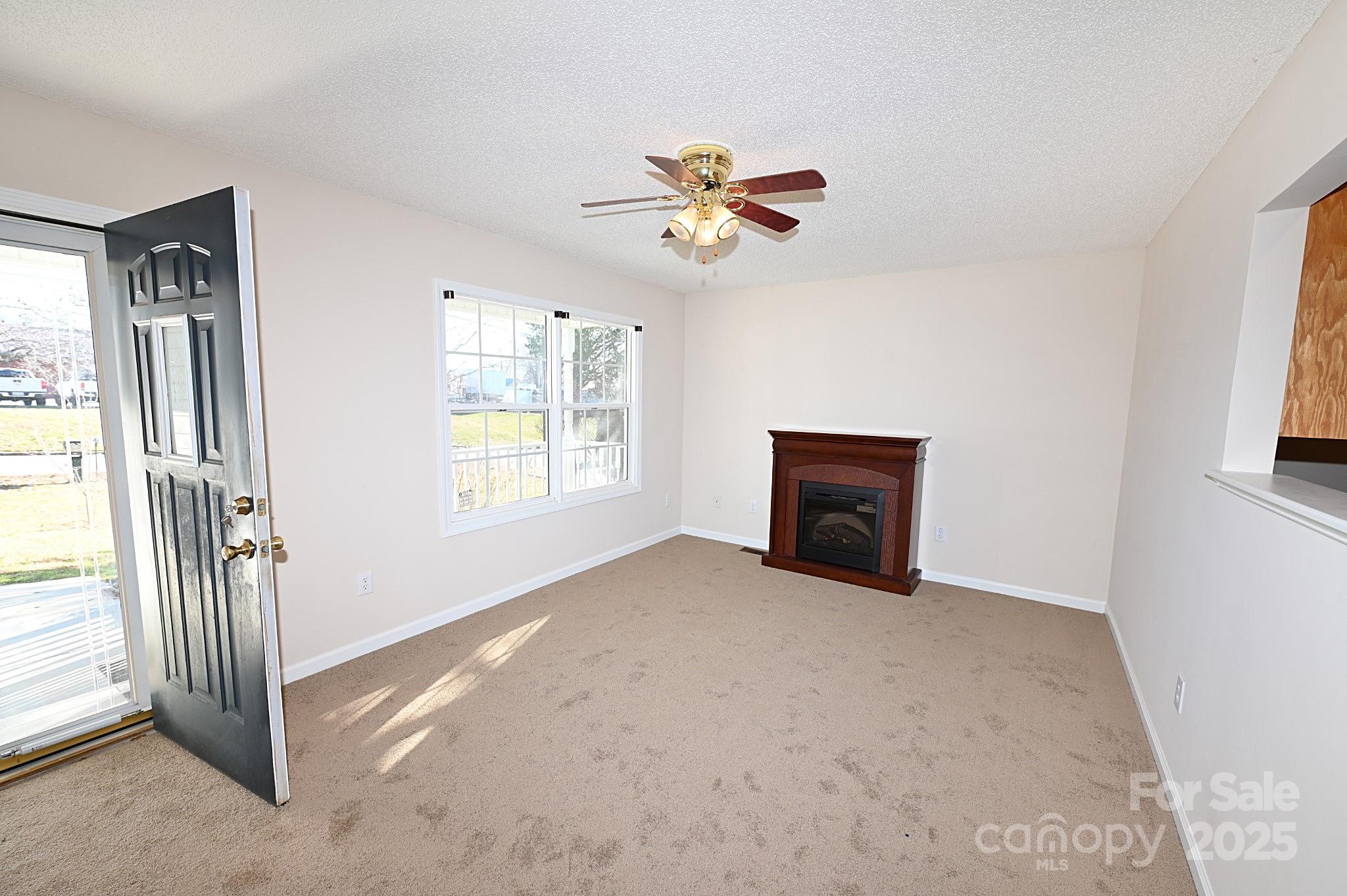 621 23rd Street Northwest Hickory, NC 28601 - Photo 4 of 35 a view of an empty room with a window