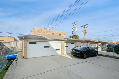 a car parked in front of a house