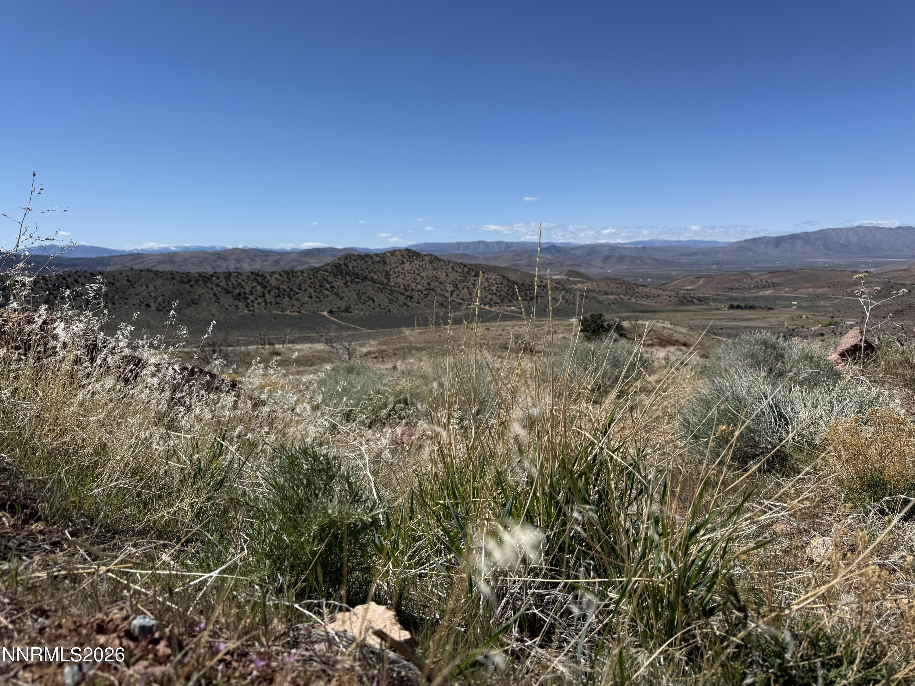 100 Wrangler Road, Unit 1 Reno, NV 89510 - Photo 6 of 20 a view of a lake with mountains in the background