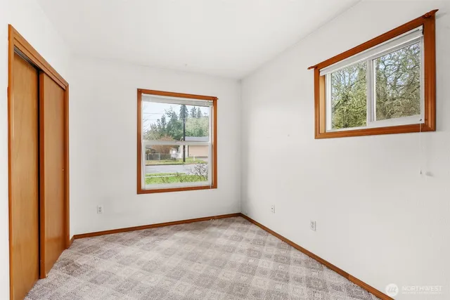 an empty room with windows