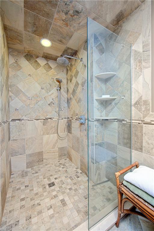 1479 Three Degree Road Mars, PA 16046 - Photo 14 of 24 Just beautiful! 2 rainhead shower fixtures, built-in shelving, glass door with easy entrance. Ceramic surround.