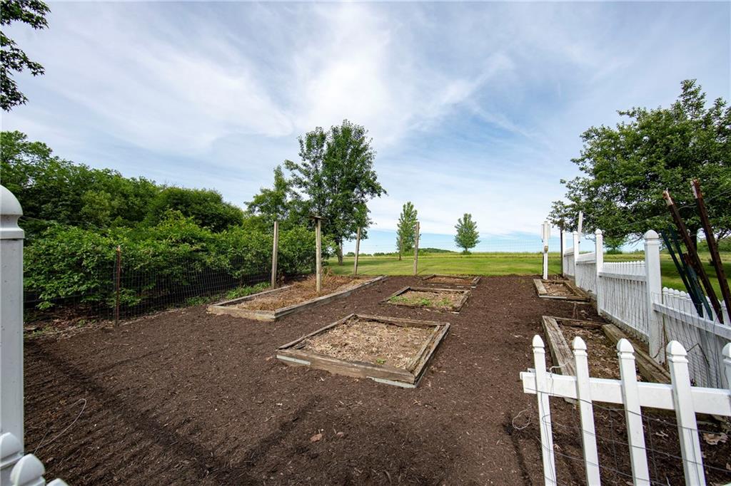 1479 Three Degree Road Mars, PA 16046 - Photo 20 of 24 Love to garden? You'll feel right at home here! Low maintenance, vinyl fencing. There are also pear trees, blueberry bushes (shown on left) and grape arbors.