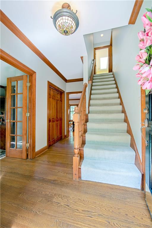 1479 Three Degree Road Mars, PA 16046 - Photo 6 of 24 The front entrance is generous in size. Large, double door coat closet in the hall. Study is on the left / dining room on the right. Family room straight ahead. Kitchen in right hand corner between dining room and family room.