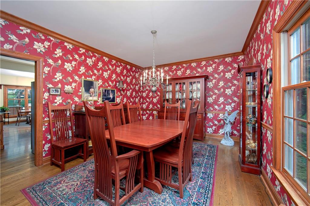1479 Three Degree Road Mars, PA 16046 - Photo 8 of 24 Large dining room (12x15) can accommodate all your furniture. Chair rail, beautiful chandelier, crown molding.
