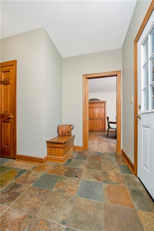 1479 Three Degree Road Mars, PA 16046 - Photo 10 of 24 A view coming in from the garage. Large closet, half bath and private laundry (with chute) are to the left. Door on right is to the deck.