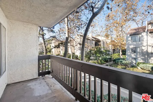 a view of a building from a balcony