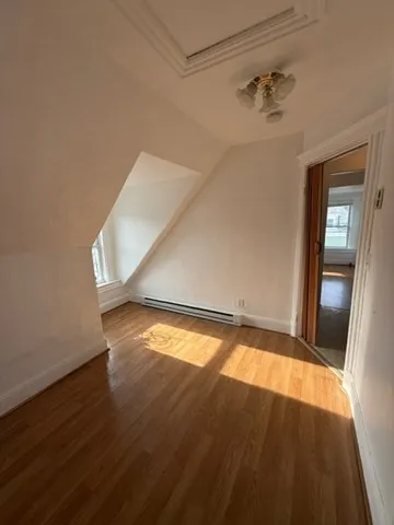a bathroom with a toilet and shower