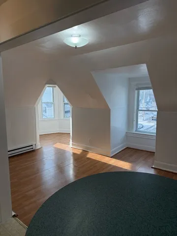 a kitchen with stainless steel appliances a refrigerator and a stove