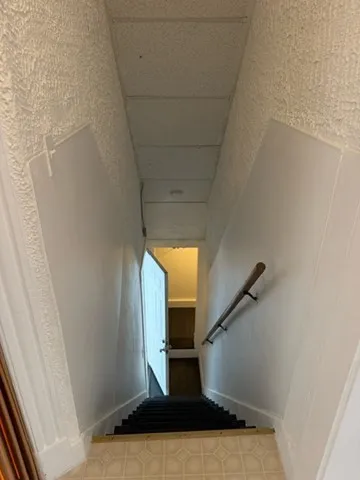 a view of a livingroom with wooden floor