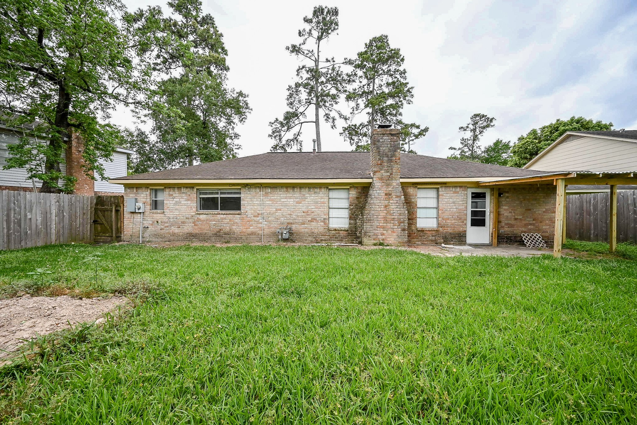 23814 Spring Gum Drive Spring, TX 77373 - Photo 20 of 21 front view of a house and a yard
