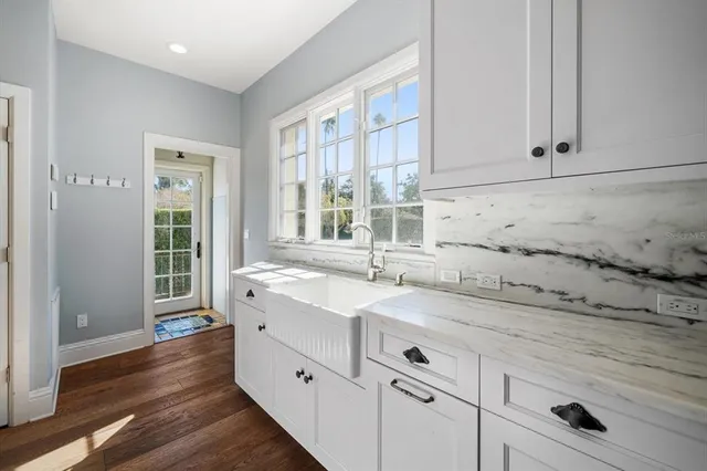 a bedroom with bed and window