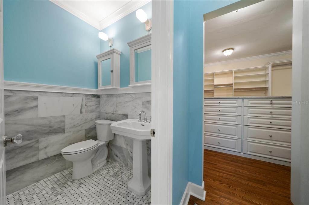 1102 Palmview Avenue Belleair, FL 33756 - Photo 35 of 81 a bathroom with a toilet and a shower