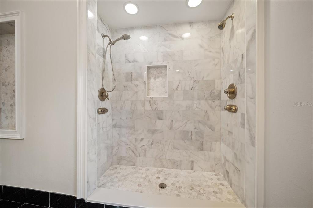 1102 Palmview Avenue Belleair, FL 33756 - Photo 40 of 81 a bathroom with a shower