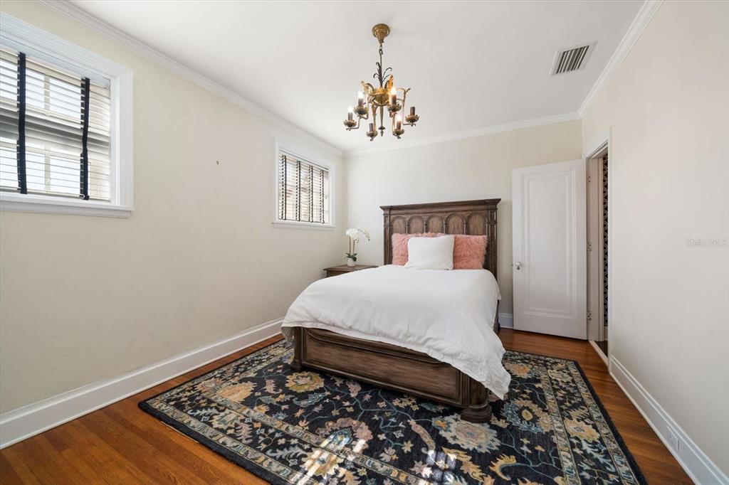 1102 Palmview Avenue Belleair, FL 33756 - Photo 41 of 81 a bedroom with bed and window